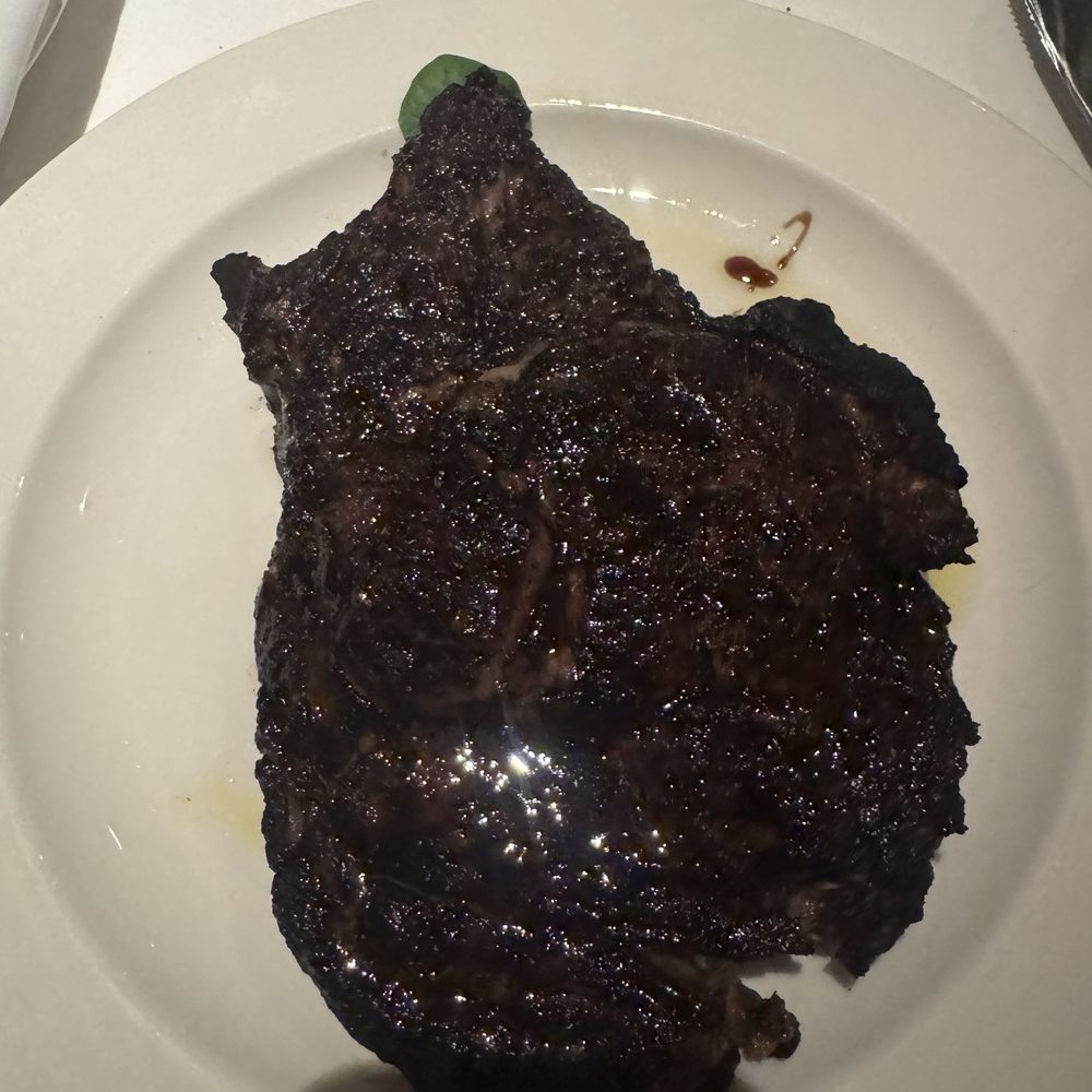 The Capital Grille - Porcini-Rubbed Bone-In Ribeye with 15-Year Aged Balsamic - Steakhouses Near Me - Burbank, California The Capital Grille - Porcini-Rubbed Bone-In Ribeye with 15-Year Aged Balsamic - Steakhouses Near Me - Burbank, California