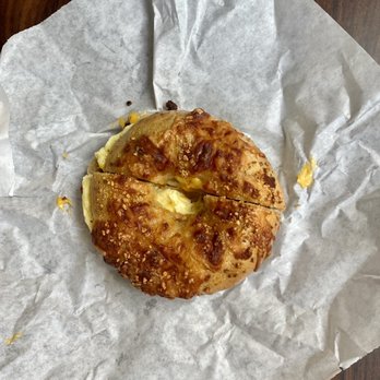 Sunrise Bagels Cafe - Bacon, egg, and cheese on a garlic Parmesan bagel - Bagels Near Me - San Ramon, California Sunrise Bagels Cafe - Bacon, egg, and cheese on a garlic Parmesan bagel - Bagels Near Me - San Ramon, California
