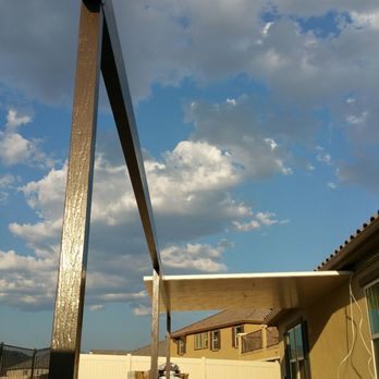Built Right Patios - Patio cover roof panels being installed by Built Right Patios. - Patio Coverings Near Me - Riverside, California