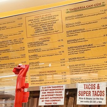 Taqueria Cancun - Menu. Sign says not responsible for internet prices (the yell app has things at like 1/3 the price) - Mexican Near Me - San Francisco, California