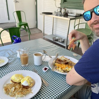 The Gilbert House - Eggs Benedict, and egg scramble, apple juice, coffee, empty cinnamon roll plate! - New American Near Me - Gilbert, Arizona The Gilbert House - Eggs Benedict, and egg scramble, apple juice, coffee, empty cinnamon roll plate! - New American Near Me - Gilbert, Arizona