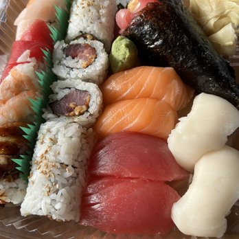 Noble Village Clawson -Noble Fish & White Wolf - #18. Rainbow Roll #52. A Spicy Tuna Handroll Tuna crunch roll Nigiri: tuna, salmon, yellowtail - Japanese Near Me - Clawson, Michigan Noble Village Clawson -Noble Fish & White Wolf - #18. Rainbow Roll #52. A Spicy Tuna Handroll Tuna crunch roll Nigiri: tuna, salmon, yellowtail - Japanese Near Me - Clawson, Michigan
