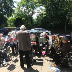 Normans Music - Meopham Brass Band playing outside our shop