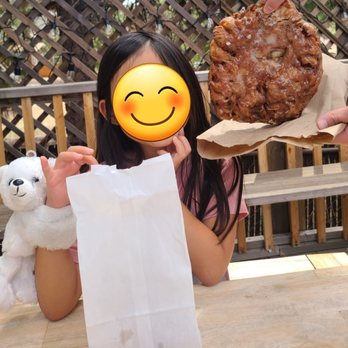 Dank Donuts - Huge apple fritter next to my daughter for reference! - Coffee & Tea Near Me - Big Bear Lake, California