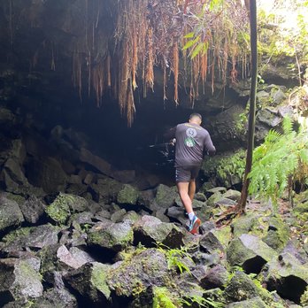 Kaumana Caves - Headed into the left cave - Parks Near Me Kaumana Caves - Headed into the left cave - Parks Near Me