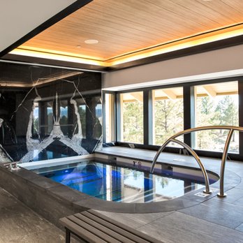 Y K Stone Center - Golf Course at Castle Pines. Mens room - Interior Design Near Me - Denver, Colorado