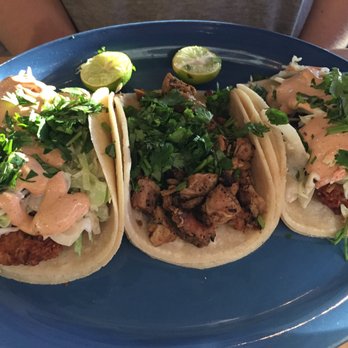 En Su Boca - Two southern fried fish tacos and a marinated grilled chicken taco. - Mexican Near Me - Richmond, Virginia