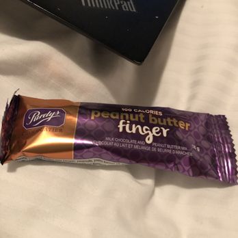 Purdys Chocolatier - a chocolate bar on a bed - Chocolatiers & Shops Near Me - Calgary, Alberta Purdys Chocolatier - a chocolate bar on a bed - Chocolatiers & Shops Near Me - Calgary, Alberta