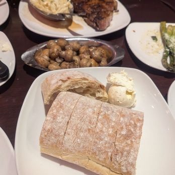 Delmonico's Italian Steakhouse - Crusty bread, mushrooms, asparagus - Italian Near Me - Syracuse, New York Delmonico's Italian Steakhouse - Crusty bread, mushrooms, asparagus - Italian Near Me - Syracuse, New York