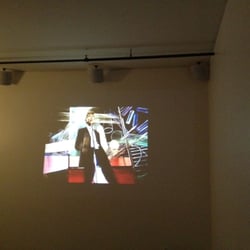 Will Help U - Projector with Martin Logan Speakers for Surround Sound.
