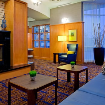 Courtyard by Marriott Toronto Markham - Connect to the Internet or relax with friends in front of our lobby fireplace. - Hotels Near Me - Markham, Ontario