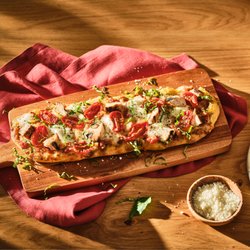 Carrabba's Italian Grill - Chicken Caprese Pizza available at lunch & Wednesday Pizza & Pours