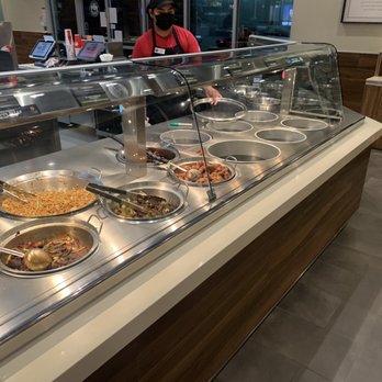 Panda Express - Service bar with empty pans... already sparkling clean because they stopped cooking hours ago. - Chinese Near Me - Palm Desert, California Panda Express - Service bar with empty pans... already sparkling clean because they stopped cooking hours ago. - Chinese Near Me - Palm Desert, California