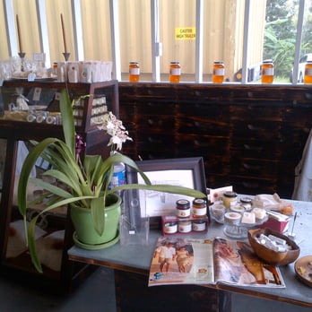 Big Island Bees - Beautifully packaged soaps and beeswax products on the counter - Honey Near Me - Captain Cook, Hawaii