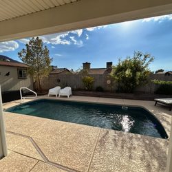 Poseidon Pools And Spas - This beautiful pool is the Praia 22 with a built in tanning ledge. It is 9'9" x 22'10"