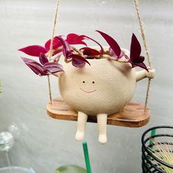 Wingard's Market - Just what this planter needed, some red "hair"
