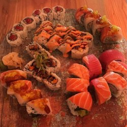 Voodoo Tuna - Traditional Futomaki Rainbow Roll, tiger roll, tempura shrimp, spicy tuna, sweet potato roll