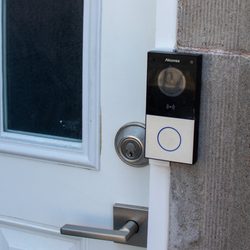 Smartful House - A small video buzzer has been installed on the private door of a multi-tenant property, serving as part of a comprehensive control system