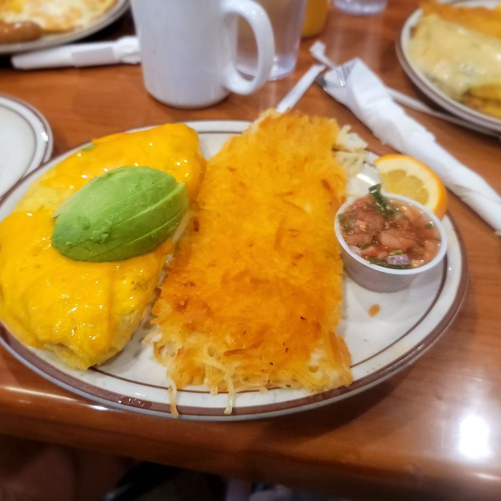 Griddlecakes - Bacon, turkey sausage and cheddar cheese omelet with hashbrowns - Breakfast & Brunch Near Me - Las Vegas, Nevada Griddlecakes - Bacon, turkey sausage and cheddar cheese omelet with hashbrowns - Breakfast & Brunch Near Me - Las Vegas, Nevada