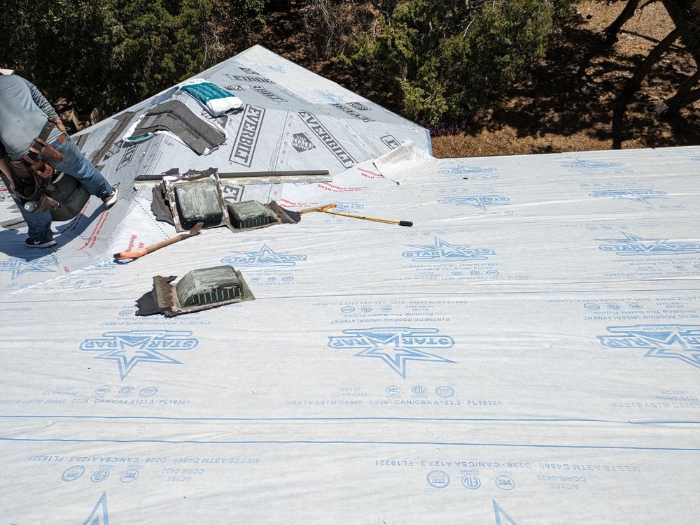 Slide of Big Boy Roofing