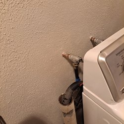 RCS Plastering and Son - Laundry room wall behind washer after (texture finish)