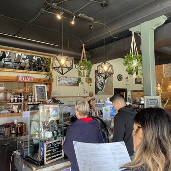 The Corner Beet - a group of people in a coffee shop - Juice Bars & Smoothies Near Me - Denver, Colorado