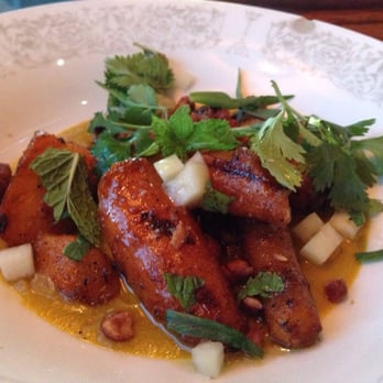 Odd Duck - Spiced carrots, carrot curry, beer nuts and cilantro - another must order! - American Near Me - Austin, Texas
