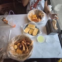 King Crab Shack - 1 pound snow crab boil with corn sausage potatoes boiled eggs & garlic bread