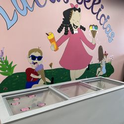 Lulu’s Delicias - Wall with a popsicle and ice cream tray bin