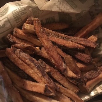 Wingstop - Burnt fries that they will gladly give you. - Chicken Wings Near Me - Austin, Texas