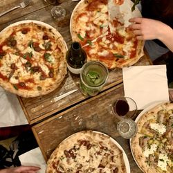 Oi Vita Pizzeria - Clockwise from upper left: NAPOLETANA, MARGHERITA, Special with burrata, roast pork and potato, KISS KILLER.