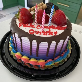 Mi Pueblito Bakery - a birthday cake with chocolate drips and strawberries - Bakeries Near Me - Cheverly, Maryland