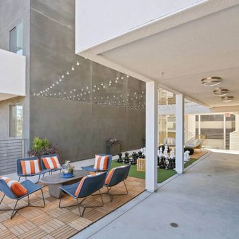 Sora - Common area with chairs and chess board - Apartments Near Me - Inglewood, California Sora - Common area with chairs and chess board - Apartments Near Me - Inglewood, California