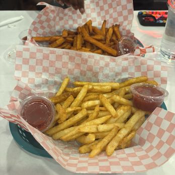 LA Fisherman - sweet potato fries w/ medium spice seasoning & Cajun Fries - Seafood Near Me - Houston, Texas