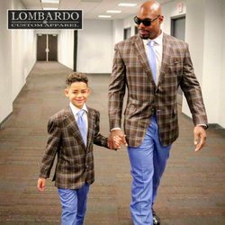 Lombardo Custom Apparel - Tyrone Smith and his son. Matching suits.