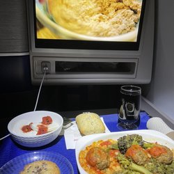 United Airlines - Addicted to the chocolate pie (left) and the veg meatballs Lol.   Thx for the upgrade United.  10.28.22