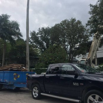 Garbageman - 10 yards Dump Trailer Load by Crane at Lagorce - Miami Beach - Junk Removal & Hauling Near Me - Miami, Florida Garbageman - 10 yards Dump Trailer Load by Crane at Lagorce - Miami Beach - Junk Removal & Hauling Near Me - Miami, Florida