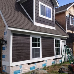 Ekstrom Contracting - James Hardie siding installation in Lake Orion, Michigan.