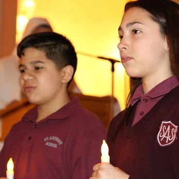 St Anthony School - Some students in prayer as the light is passed from eighth to seventh grade. - Preschools Near Me - Hawthorne, New Jersey St Anthony School - Some students in prayer as the light is passed from eighth to seventh grade. - Preschools Near Me - Hawthorne, New Jersey