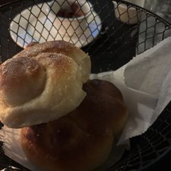 Toni's Italian Restaurant - Warm garlic knots with dipping sauce.