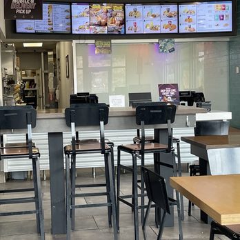 Taco Bell - tables and chairs in a restaurant - Tacos Near Me - Roseburg, Oregon Taco Bell - tables and chairs in a restaurant - Tacos Near Me - Roseburg, Oregon