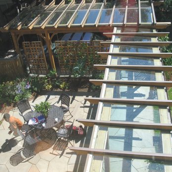 Everlast Landscape - a patio with a pergol roof - Landscaping Near Me Everlast Landscape - a patio with a pergol roof - Landscaping Near Me