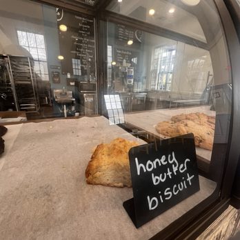 Nolita - a bakery window with a sign that says honey burger biscuit - Bakeries Near Me - New Orleans, Louisiana Nolita - a bakery window with a sign that says honey burger biscuit - Bakeries Near Me - New Orleans, Louisiana