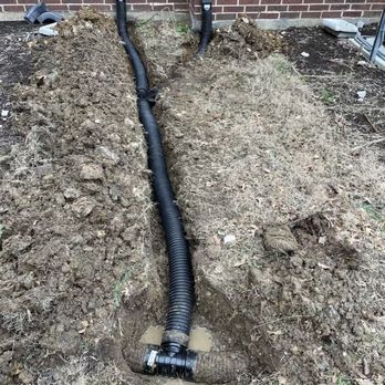 Dallas Drainage Pros - a drainage pipe in the ground - Landscaping Near Me Dallas Drainage Pros - a drainage pipe in the ground - Landscaping Near Me