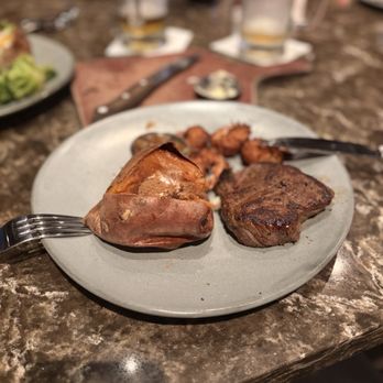 Outback Steakhouse - Sirloin with coconut shrimp combo with sweet potatoe - Steakhouses Near Me - Sunrise, Florida Outback Steakhouse - Sirloin with coconut shrimp combo with sweet potatoe - Steakhouses Near Me - Sunrise, Florida