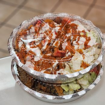 Halal Bite - a plate of food wrapped in aluminum foil - Halal Near Me - Coram, New York