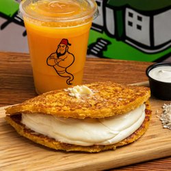 Corn cachapa, sweet corn pancake, queso de mano, melted white cheese, sweet and savory, traditional Venezuelan food, comfort food, artisan c