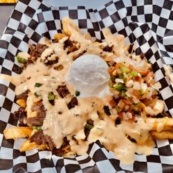 Grubbz - Our Firehouse Fries come stacked with juicy steak, jalapeños, melted fiesta cheese, fresh pico, sour cream & our signature sauce.