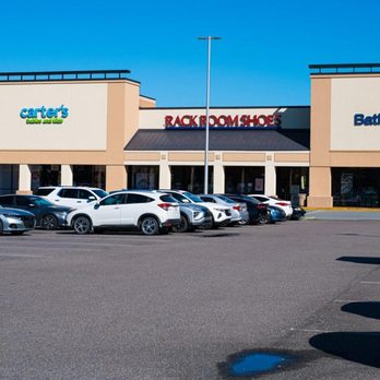 Rack Room Shoes - Parking Lot Entrance with Signage - Shoe Stores Near Me - Gainesville, Florida Rack Room Shoes - Parking Lot Entrance with Signage - Shoe Stores Near Me - Gainesville, Florida