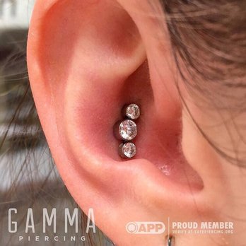 Gamma Piercing - Conch piercing immediately after the appointment with a cluster piece of jewelry. I LOVE it. - Piercing Near Me - Ann Arbor, Michigan Gamma Piercing - Conch piercing immediately after the appointment with a cluster piece of jewelry. I LOVE it. - Piercing Near Me - Ann Arbor, Michigan